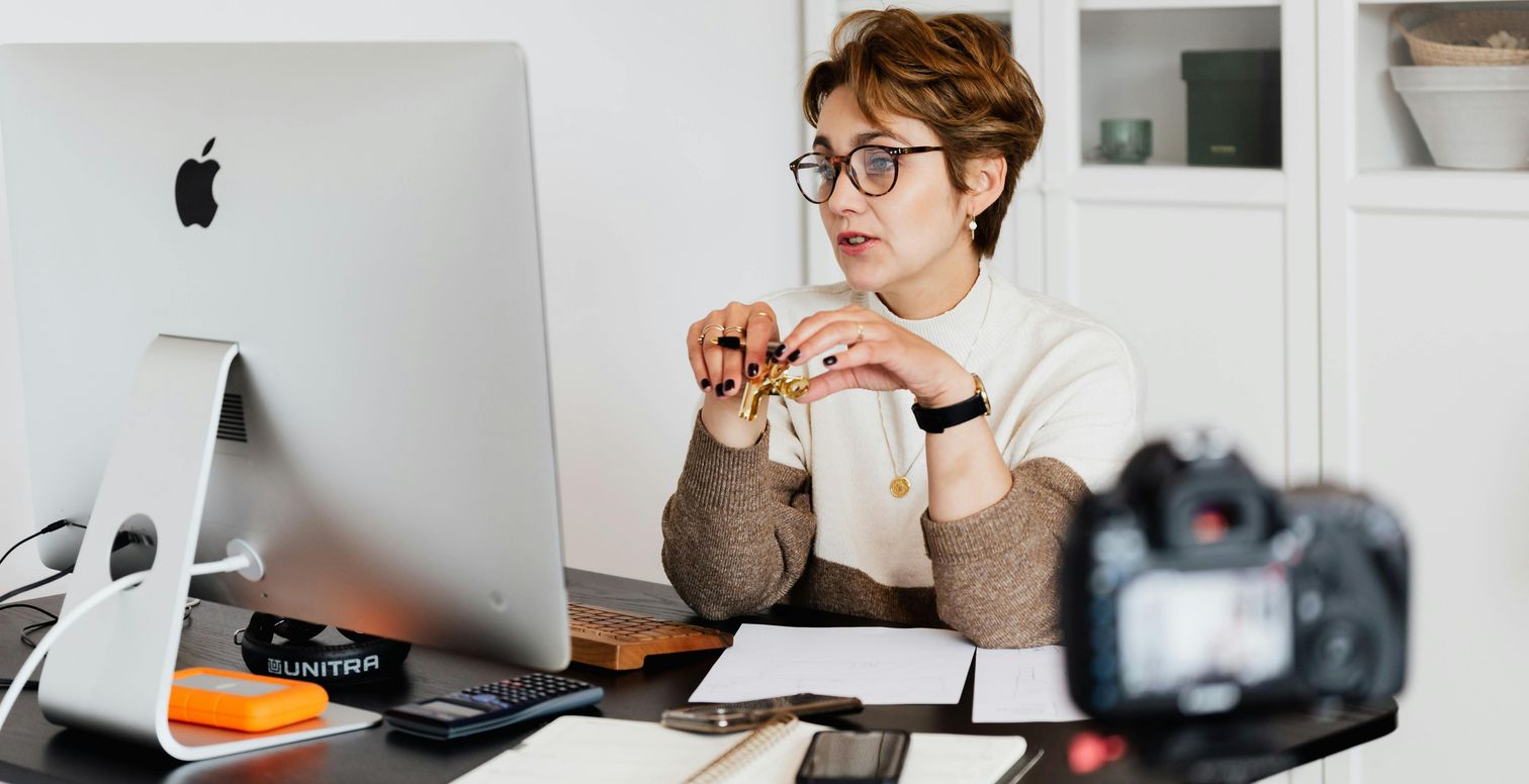 Woman sitting in front of a computer